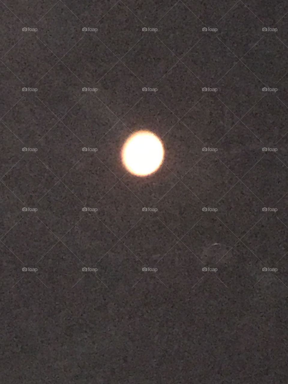 A brilliant full moon at night. It is a beautiful sight worth photographing.