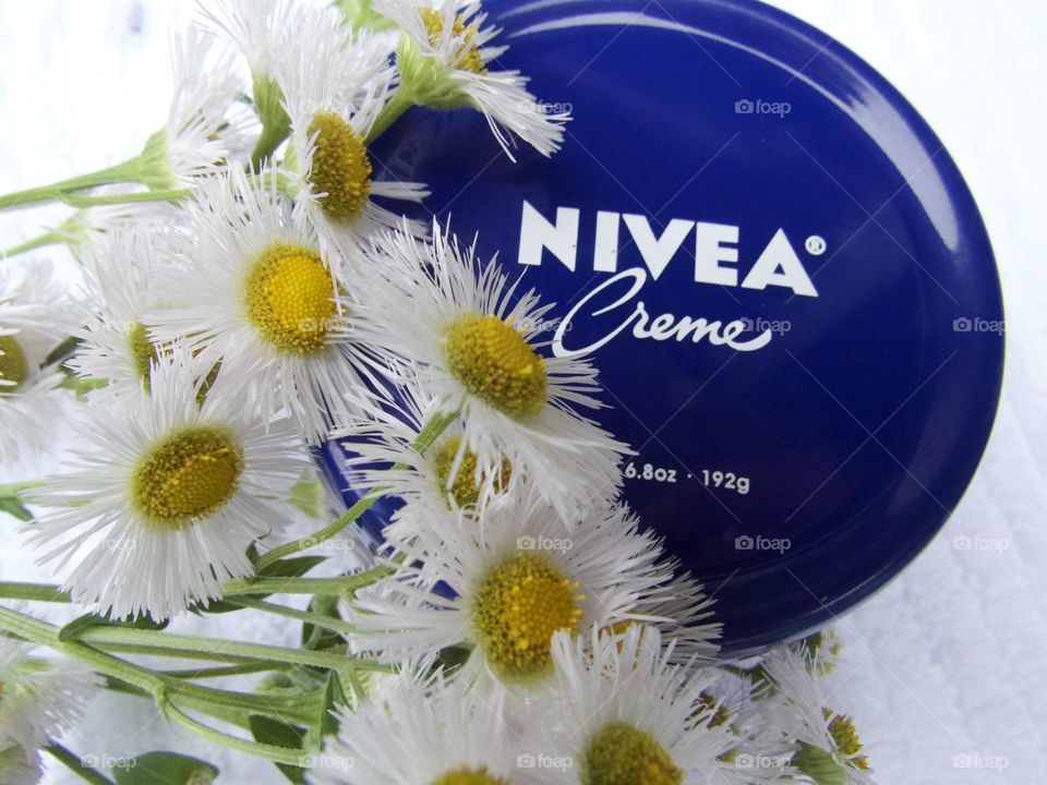 Nivea Crème with wildflowers.