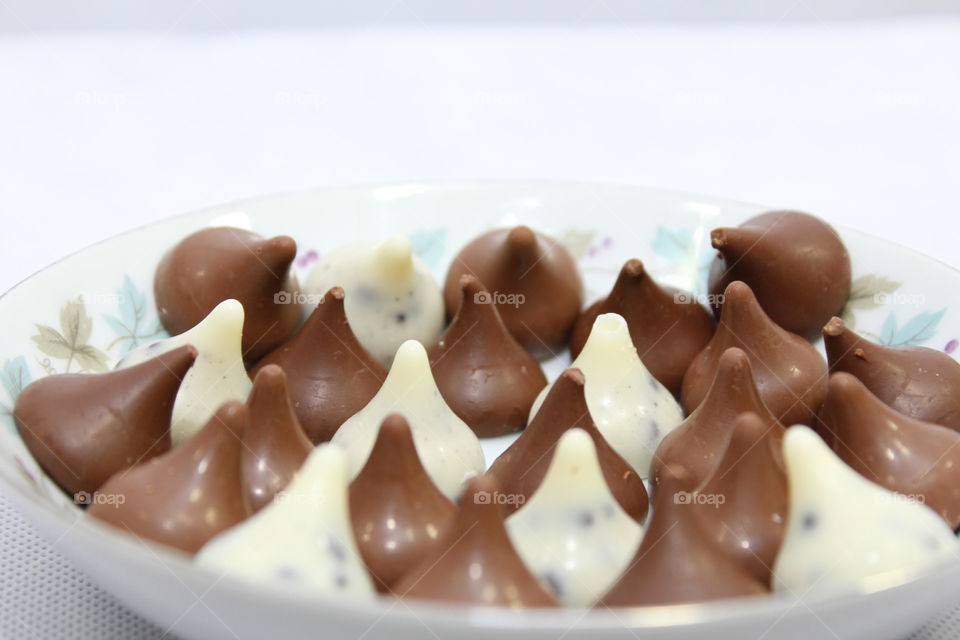 bowl full of white and brown chocolate