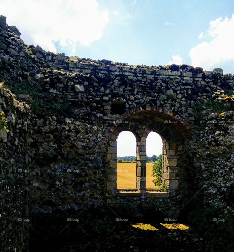 Medieval castle ruins in Castle Rising, Norfolk, England