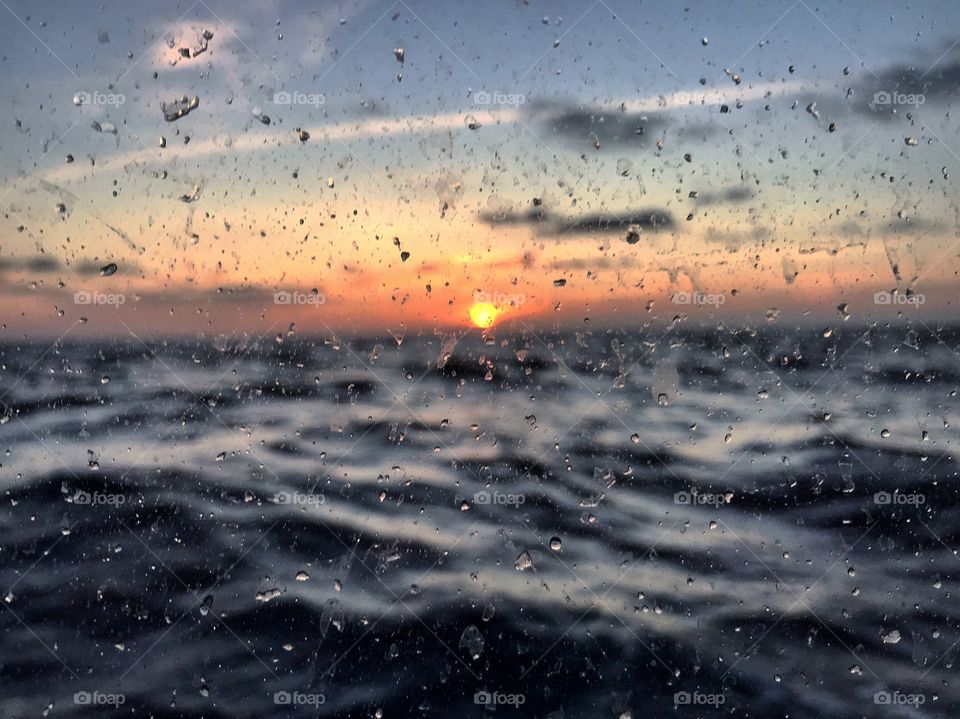 a sunset sailing in the atlantic ocean