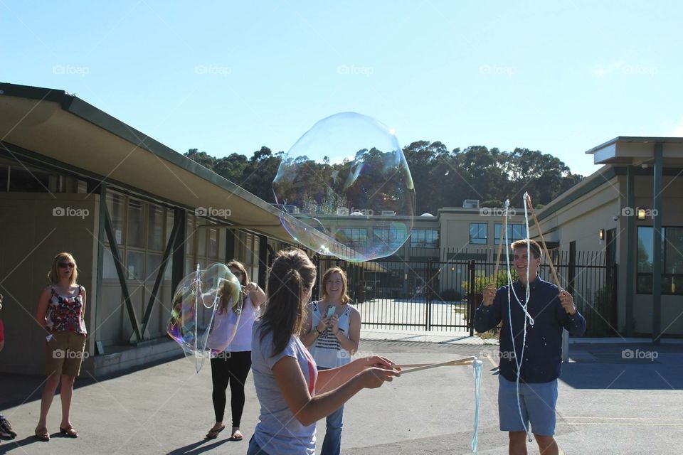 Making bubbles. Fourth of July bubble contest