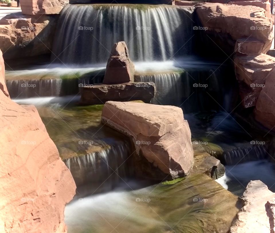 Slow shutter water fall with sandstone 