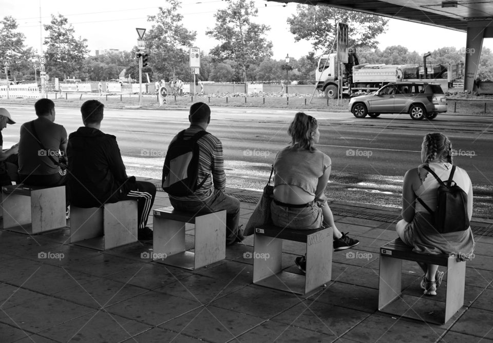 The Wait ... passengers waiting under the bridge for a bus to arrive in Bratislava ... 