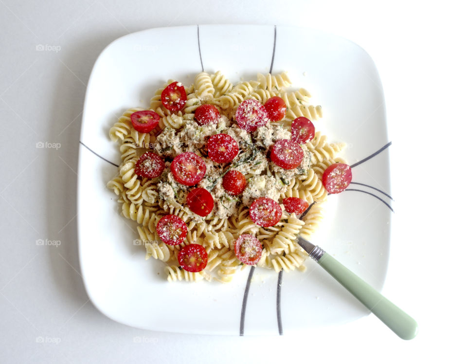 Overhead shot of a plate of salmon pasta salad.