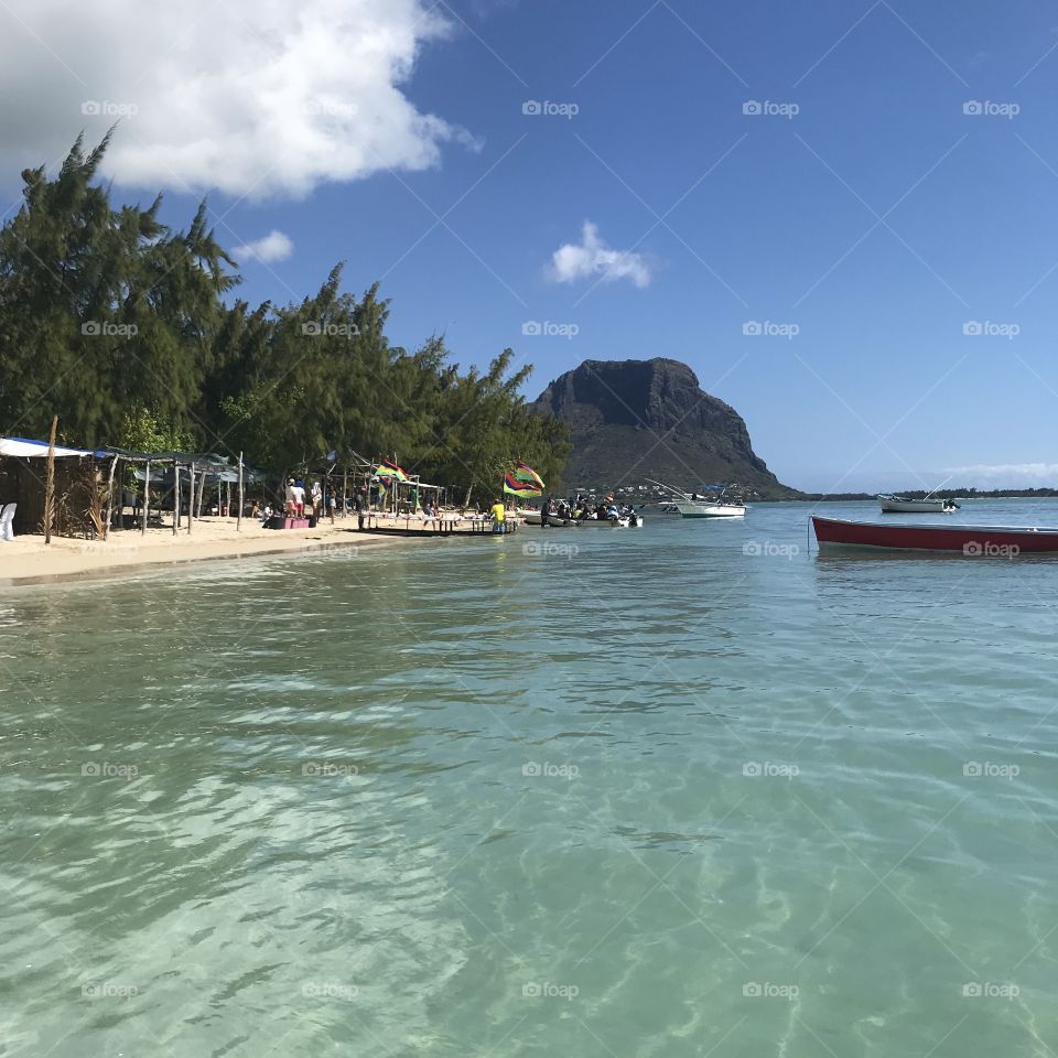  Île aux Benitiers has beautiful clear waters and locals selling all kinds of items to tourist who visit Mauritius.