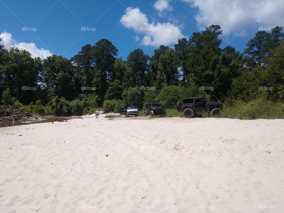 Jeeps and sand