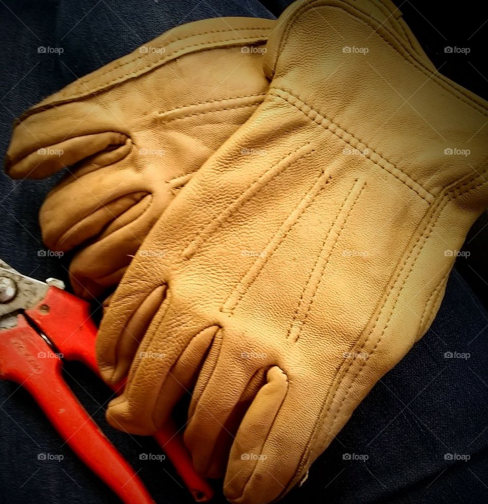 Work gloves and denim make the world turn