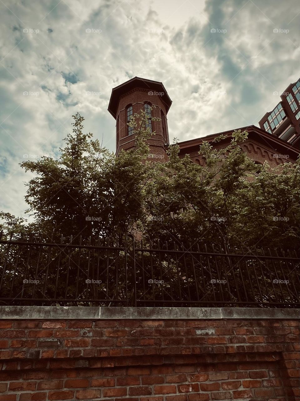 Cool, eerie building behind the wall 