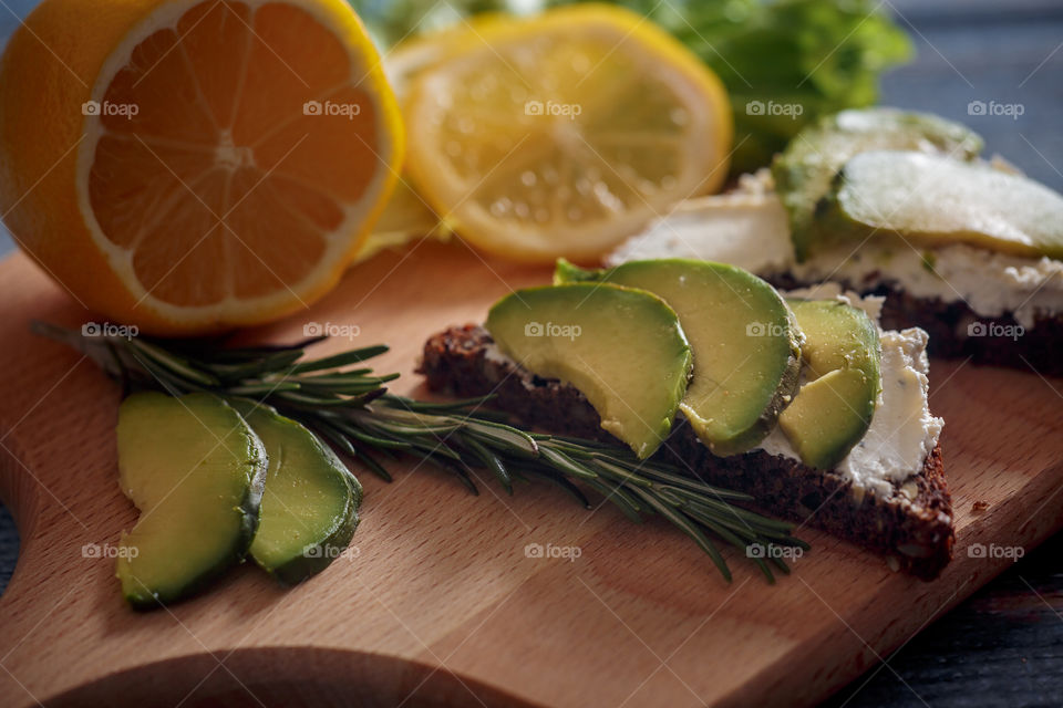 Dietary sandwiches with grain bread, cream cheese and avocado