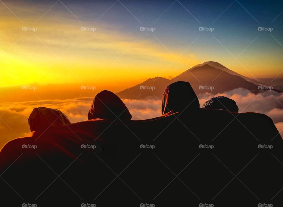 Friendship in the Morning twilight sky moment on Indonesia Volcano