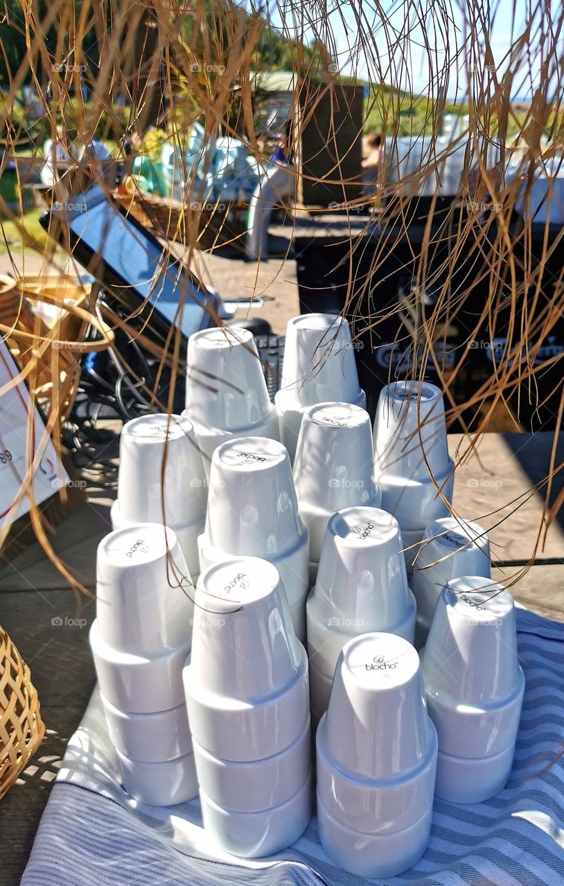 Coffee cups at the beach bar