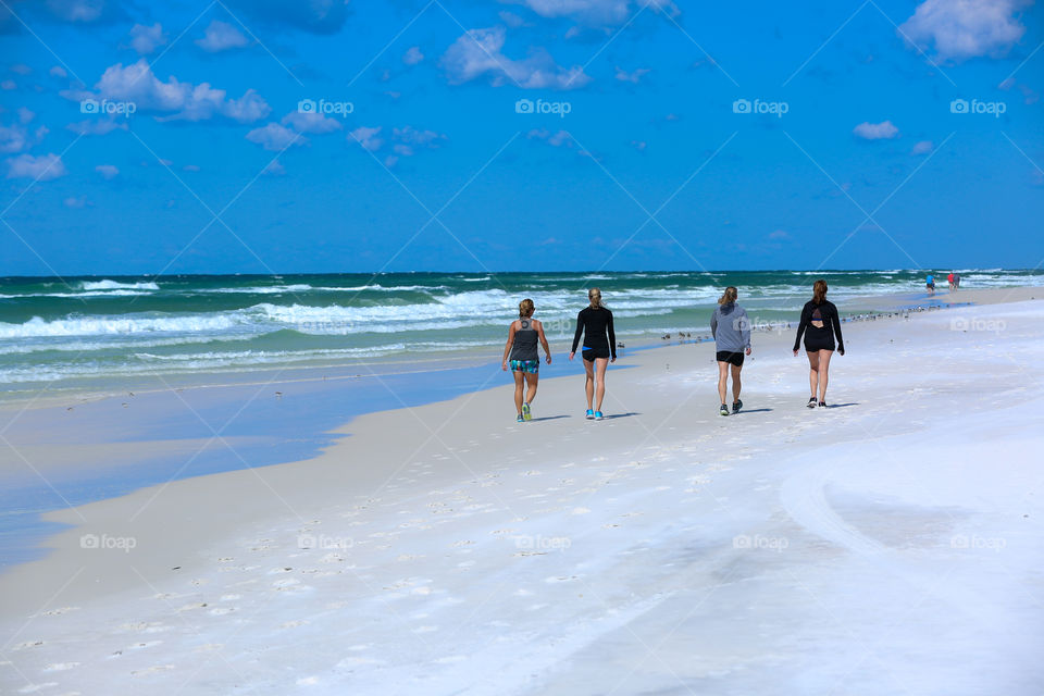 Group Walk on the Beach