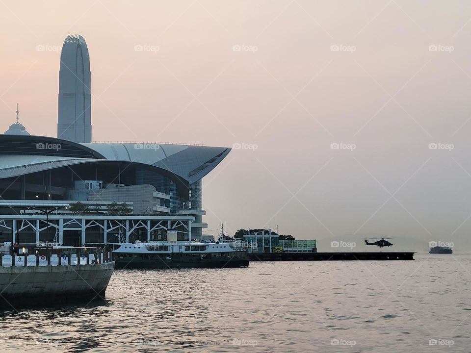 Hong Kong landmark architecture The Convention Centre at sunset