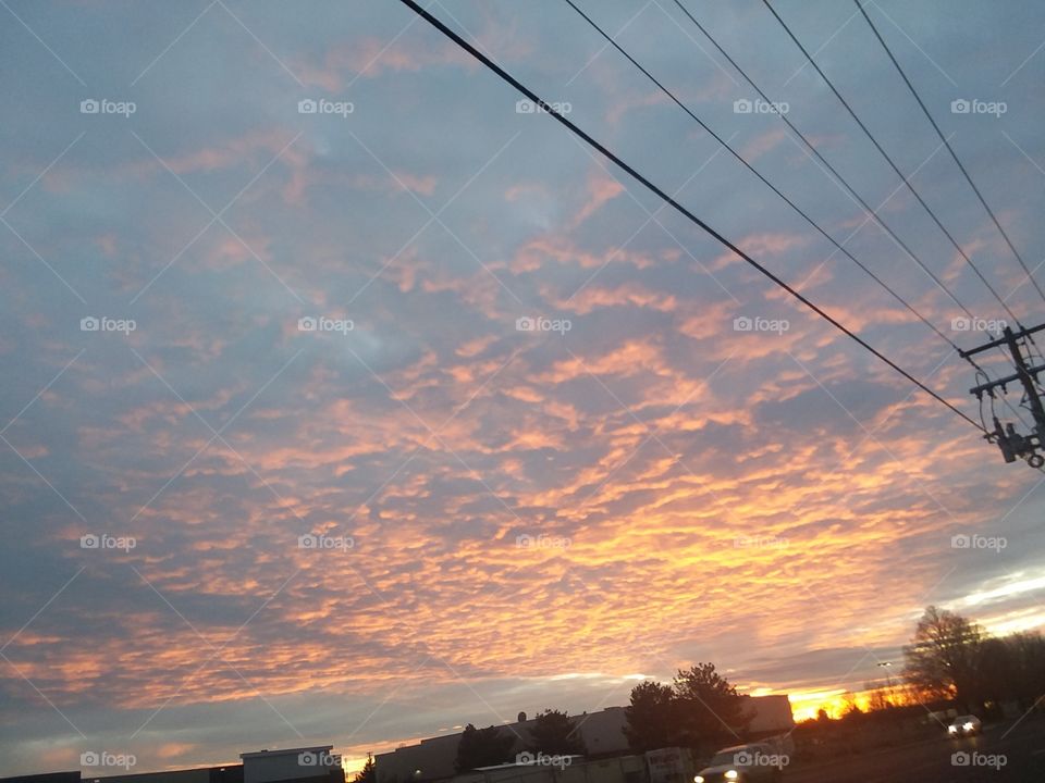 Beautiful sunset painting in the sky.