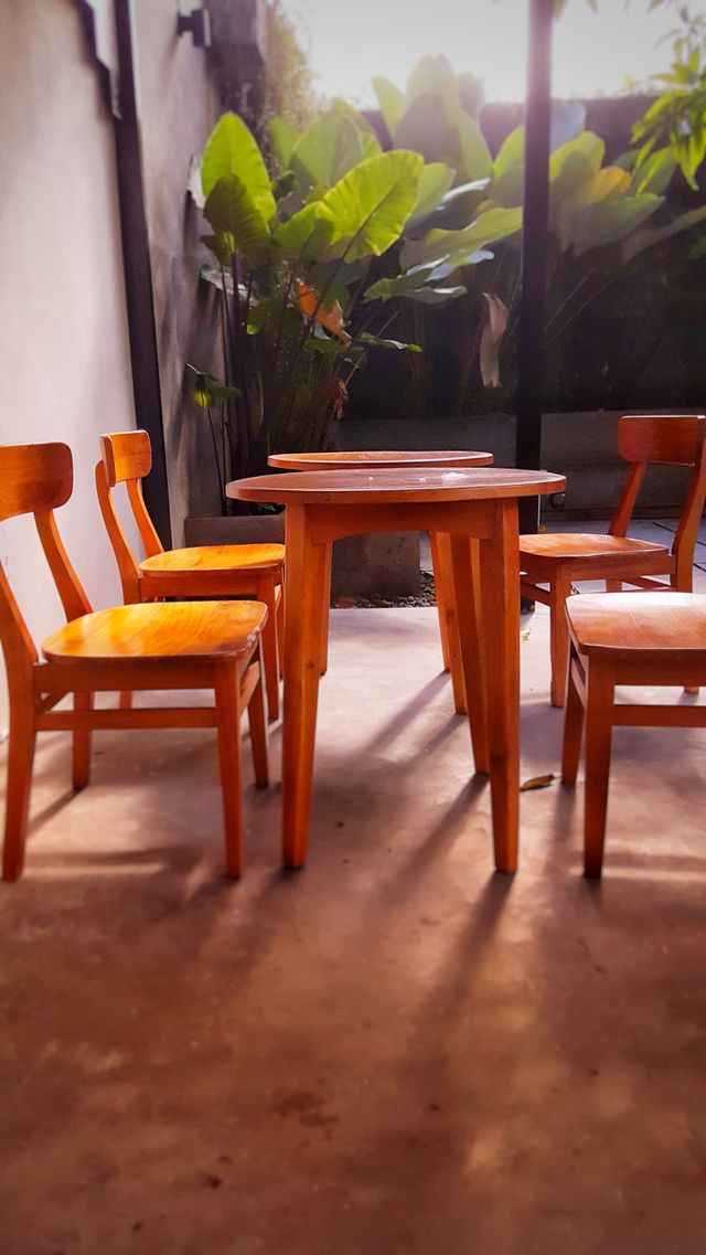 Relax in the morning with wooden table and chairs