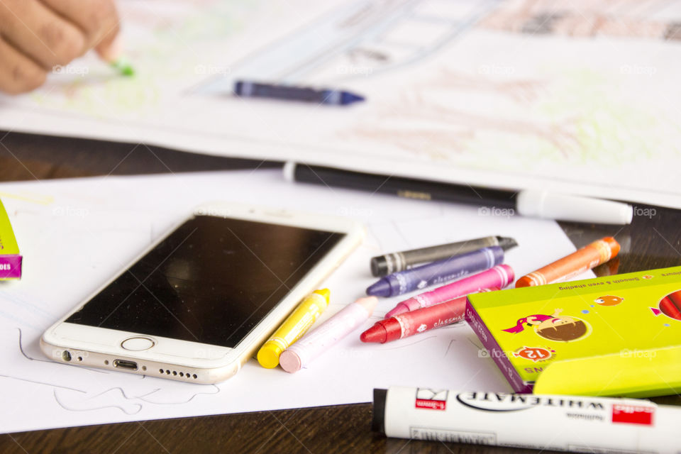 White smartphone on drawing room table