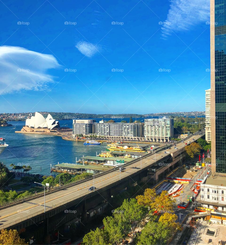 View over Sydney harbor to circular quay and the opera house 