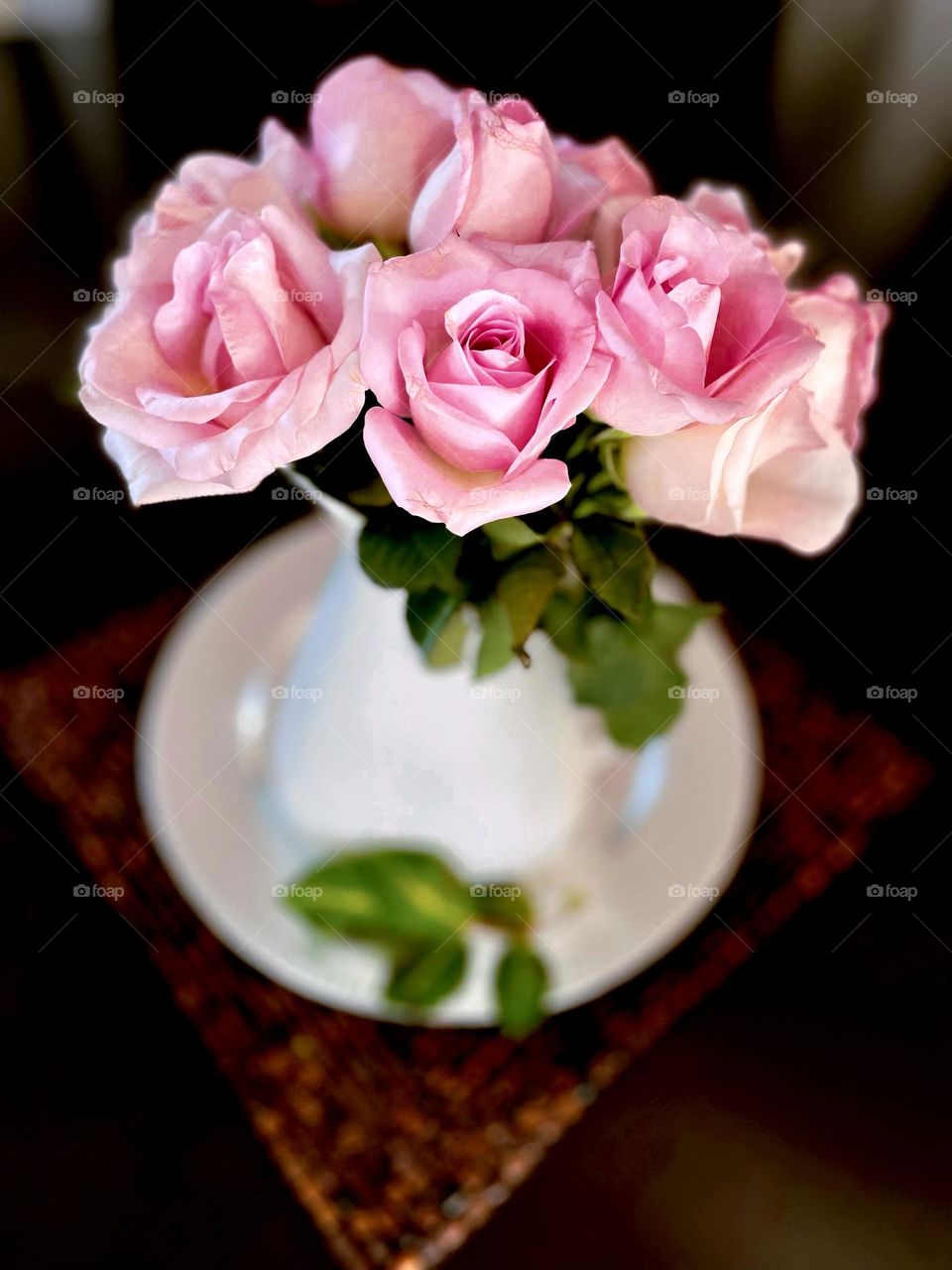 Pink roses in vase blurred