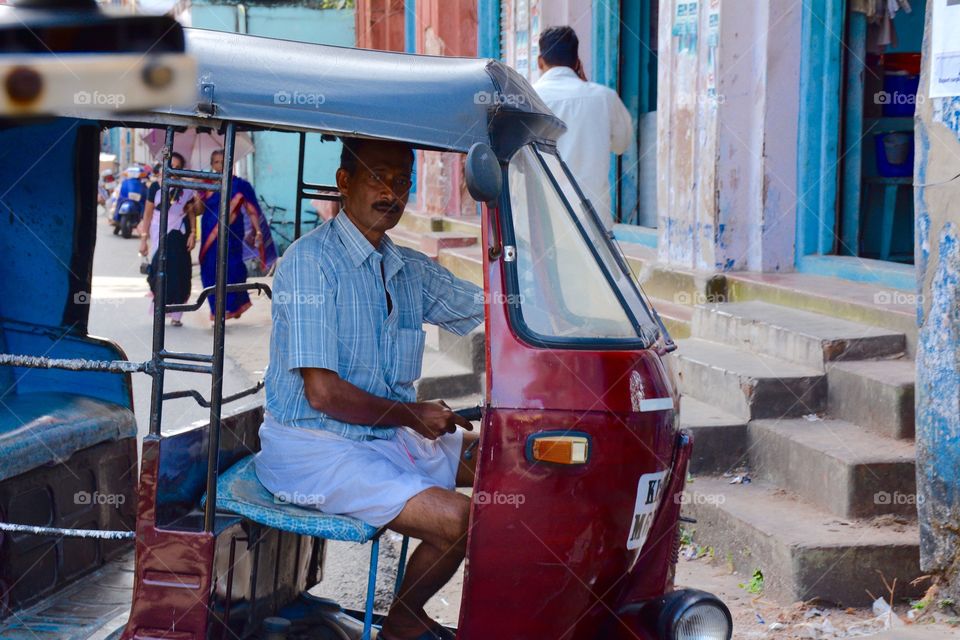 Close-up of auto rickshaws driver