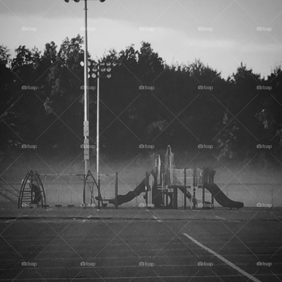 Playground in the fog. 