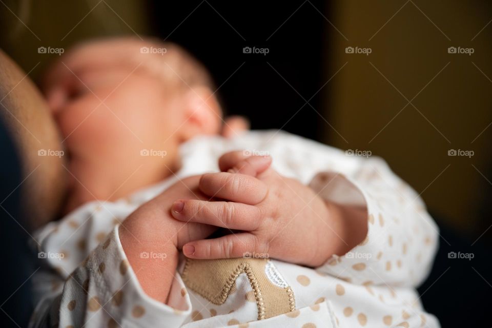 infant being breastfed