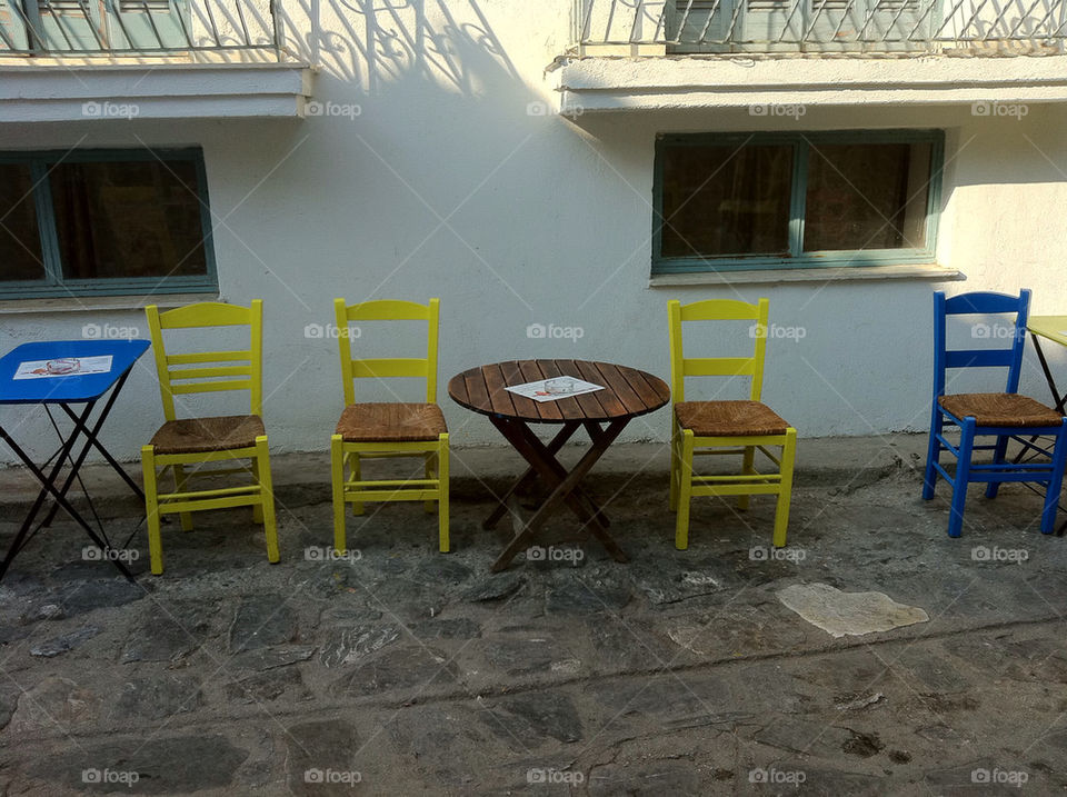 yellow greece chairs taverna by lenah