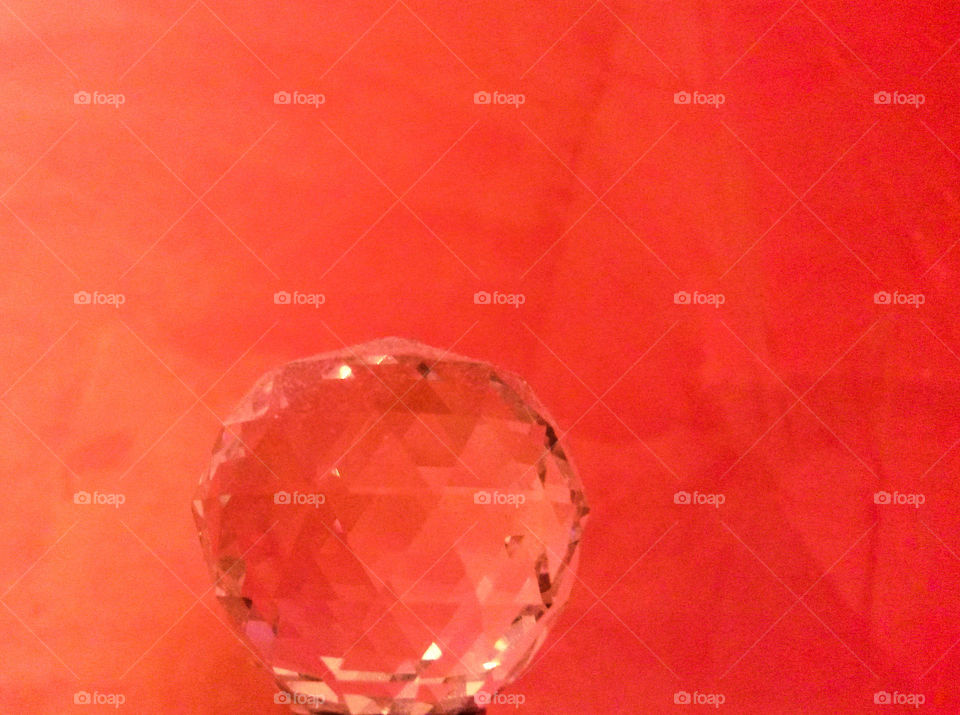 Crystal ball on red background