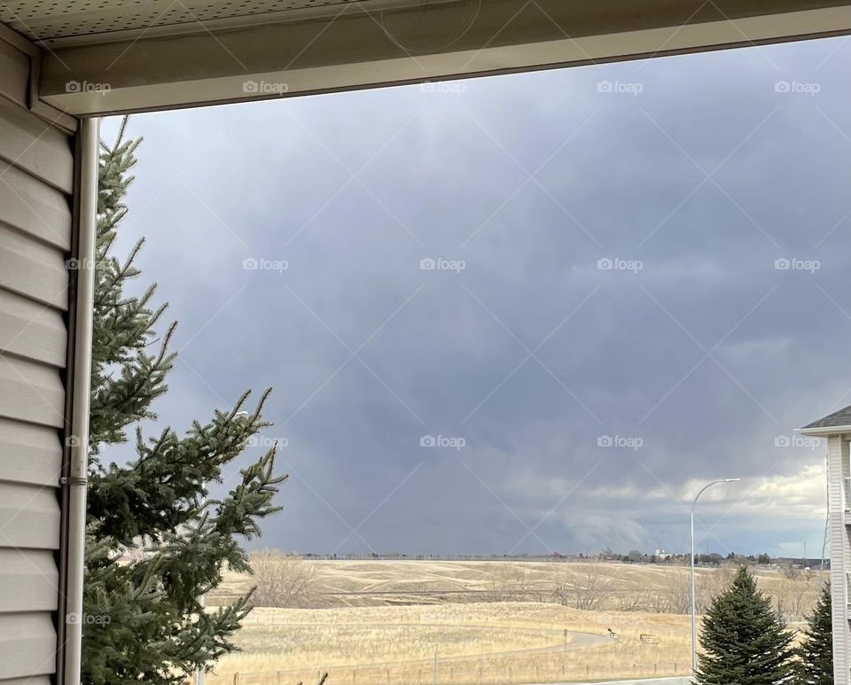 Storm is a brewing on the bald prairies 