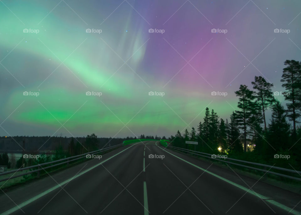 Aurora lights and road at night