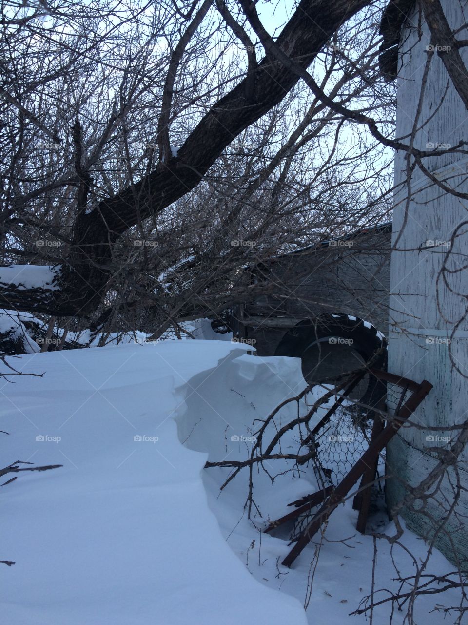 Snow bank and old machinery 