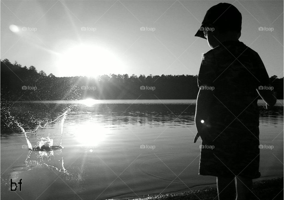 Throwing Rocks In The Lake
