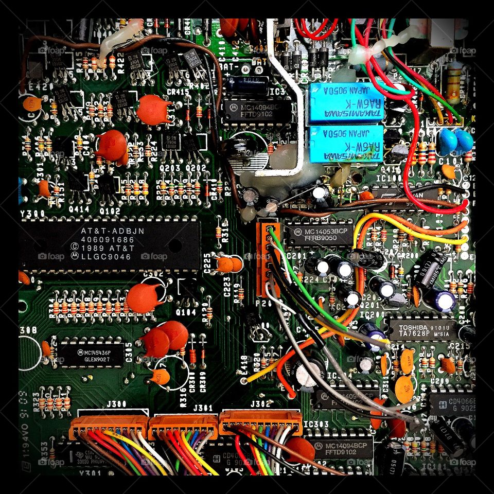 Inside View Of An Electronic Motherboard, Lots Of Intricacies And Colors