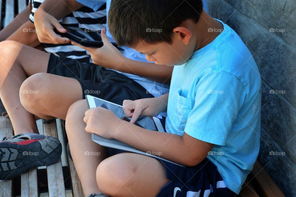 Children using IPads