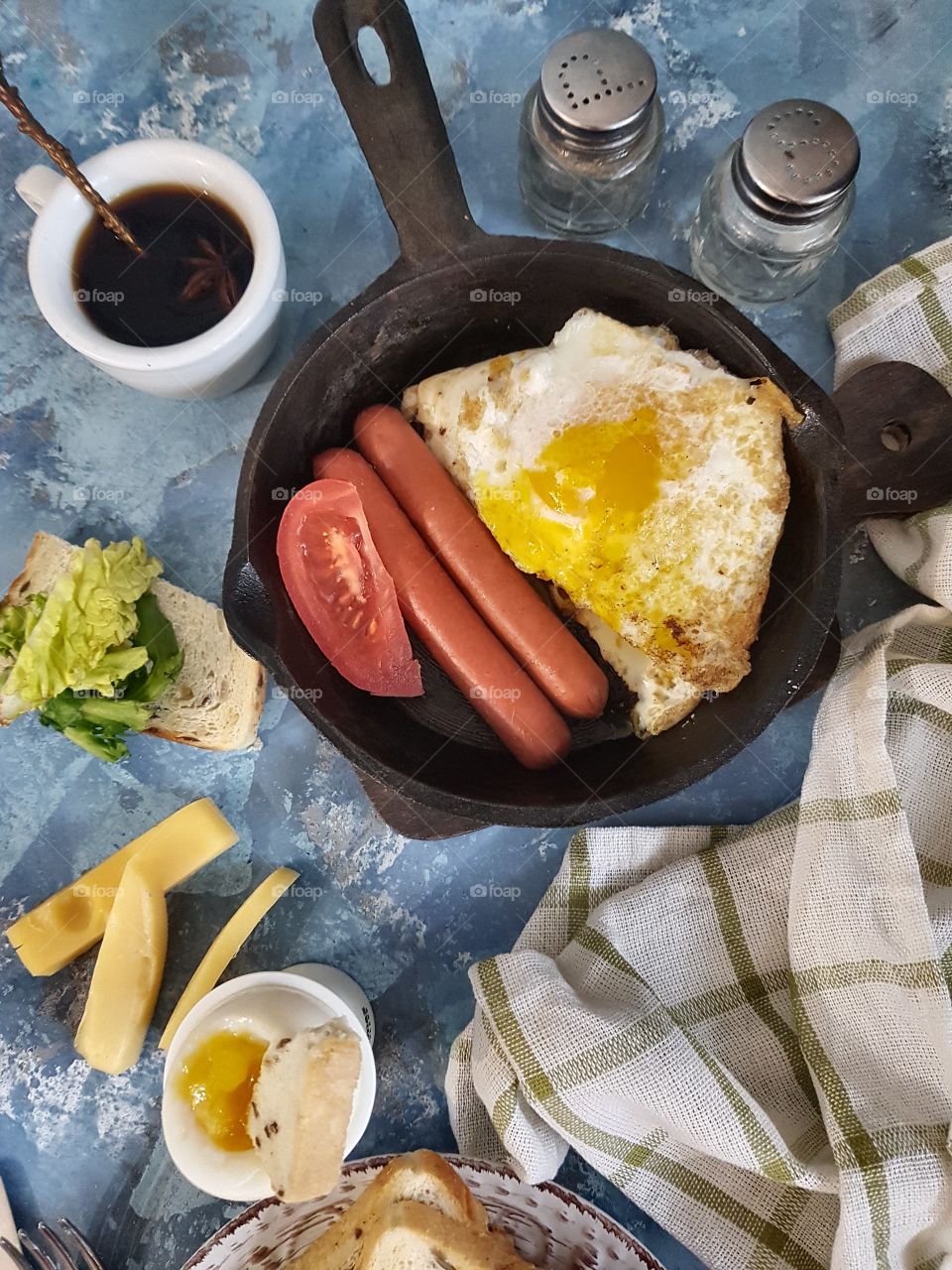 breakfast with egg, vegetables and sausage