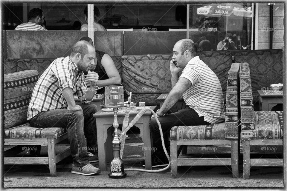 Men sitting in traditional cafe in Istanbul Turkey