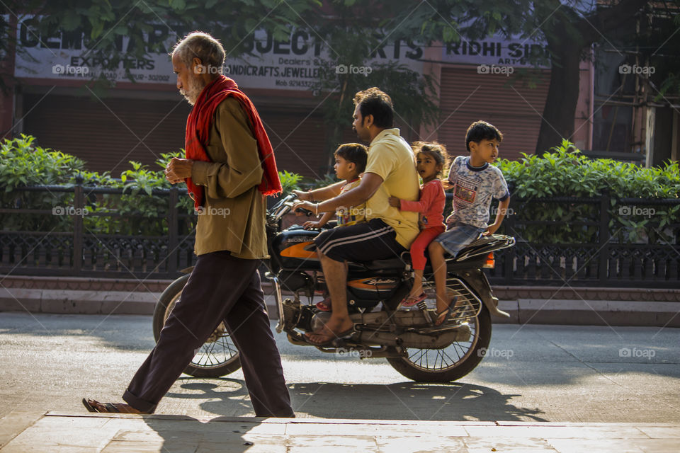 jaipur, Rajasthan, India - september 21 , 2018. Old man walking with red cloth