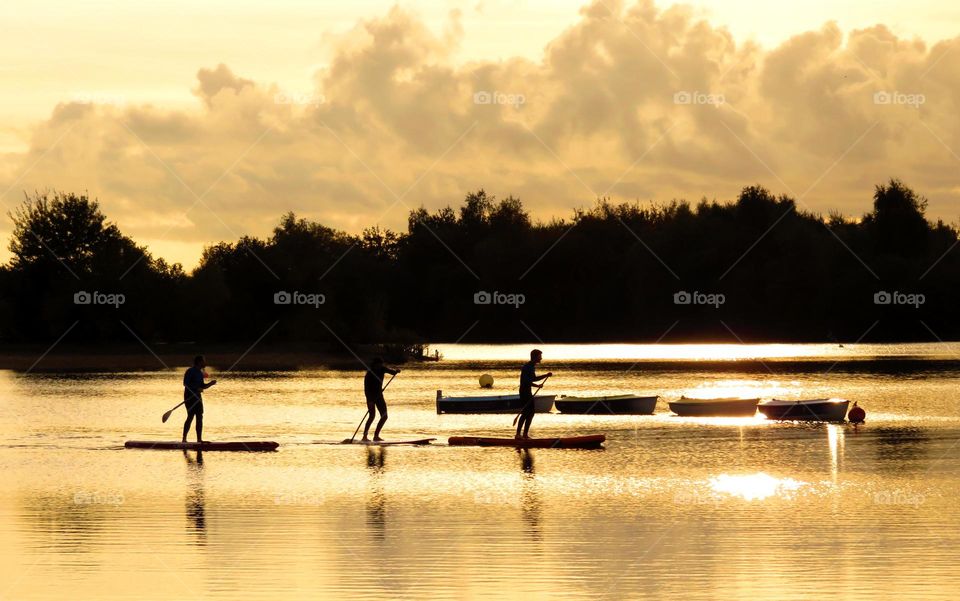 paddling in the sunset