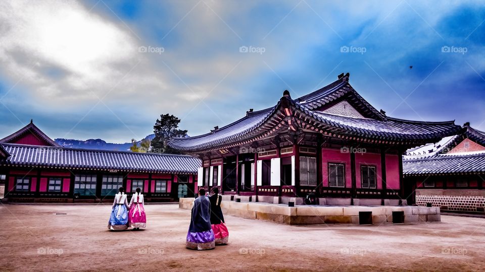 traditional dress korean girls walking in the palace