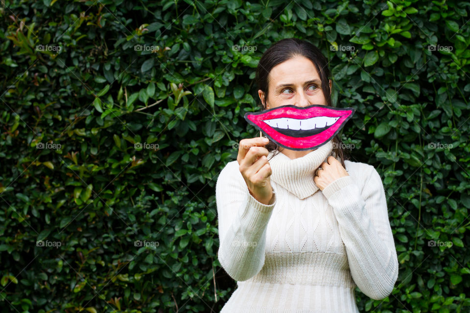 comic style laugh and smile woman holding paper smile