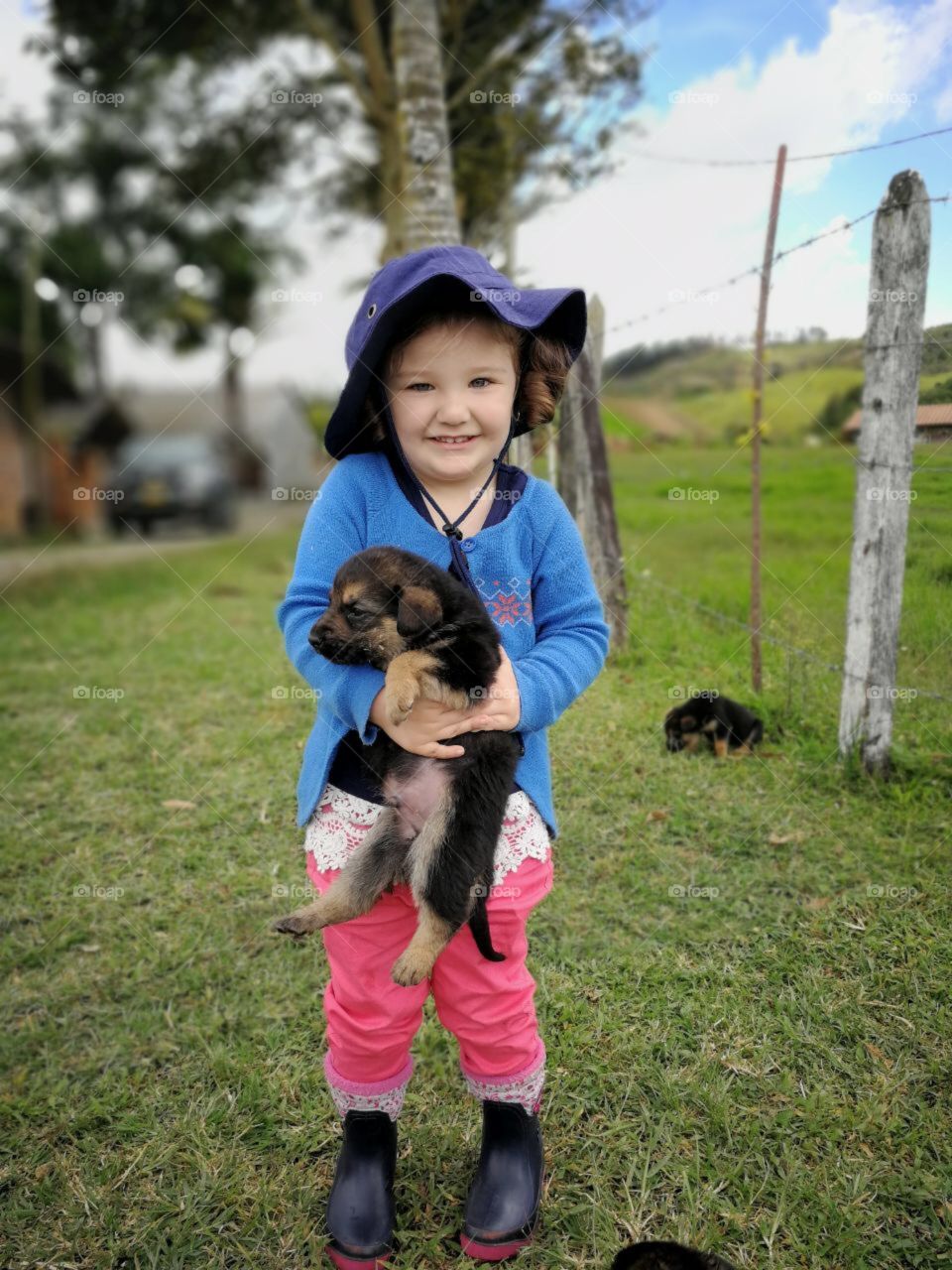 Little dog with little girl