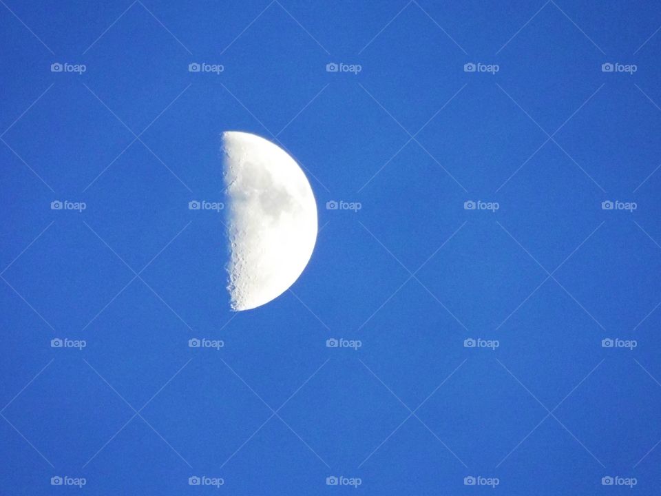 Moon in the blue sky