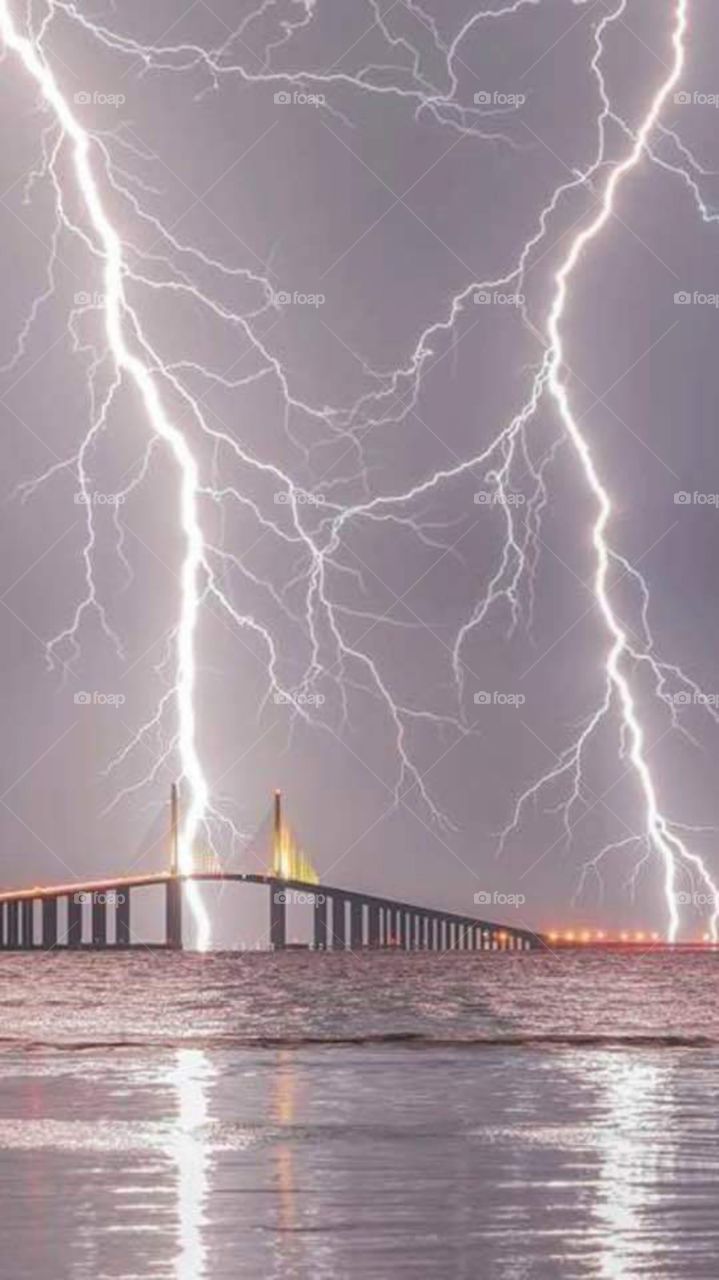lightning strikes directly onto the bay. beautiful and scarey