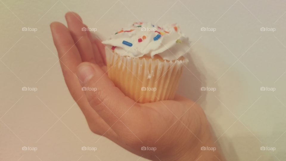 Holding cupcake