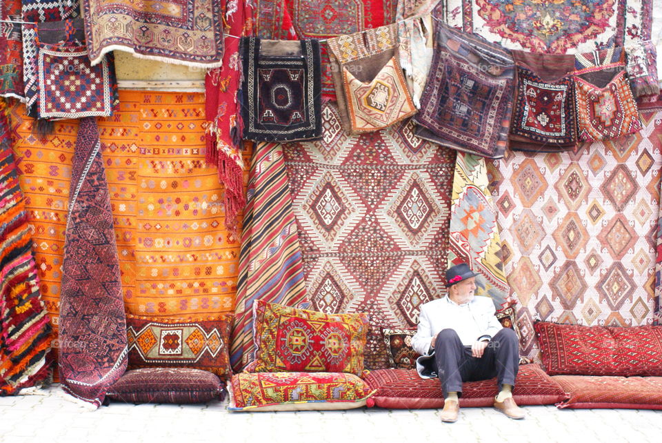 Colors from Turkey. I was in Capadokya and, when I saw that man and the rugs, I knew I had the perfect pic of such an amazing country. 