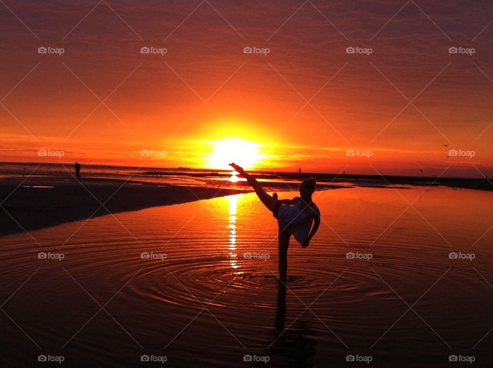 Taekwondo kick at sunset