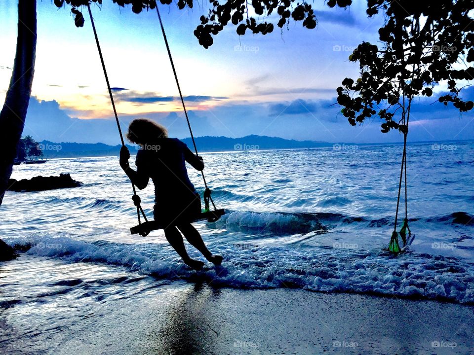 Swinging on ocean