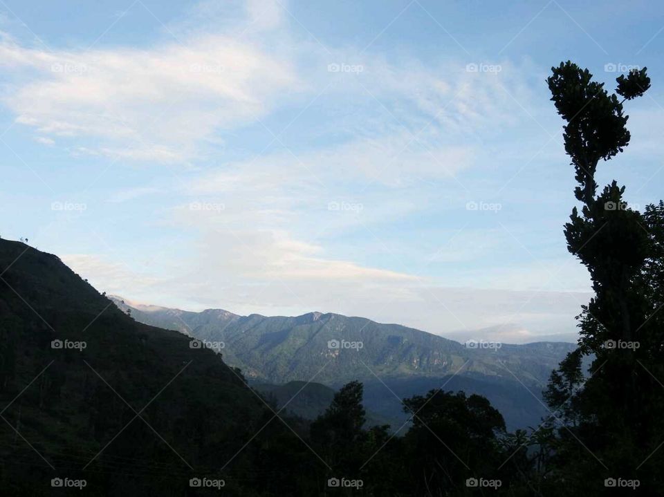 Early morning sun touching hill tops.# what a wonderful site # heavenly experience.