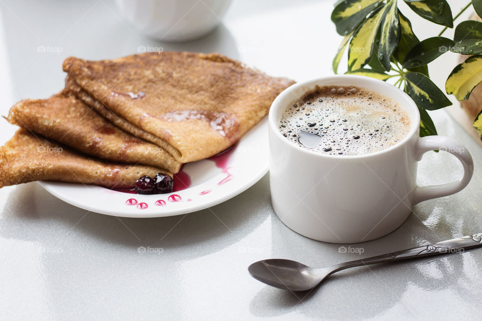 Coffee and pancakes for the breakfast