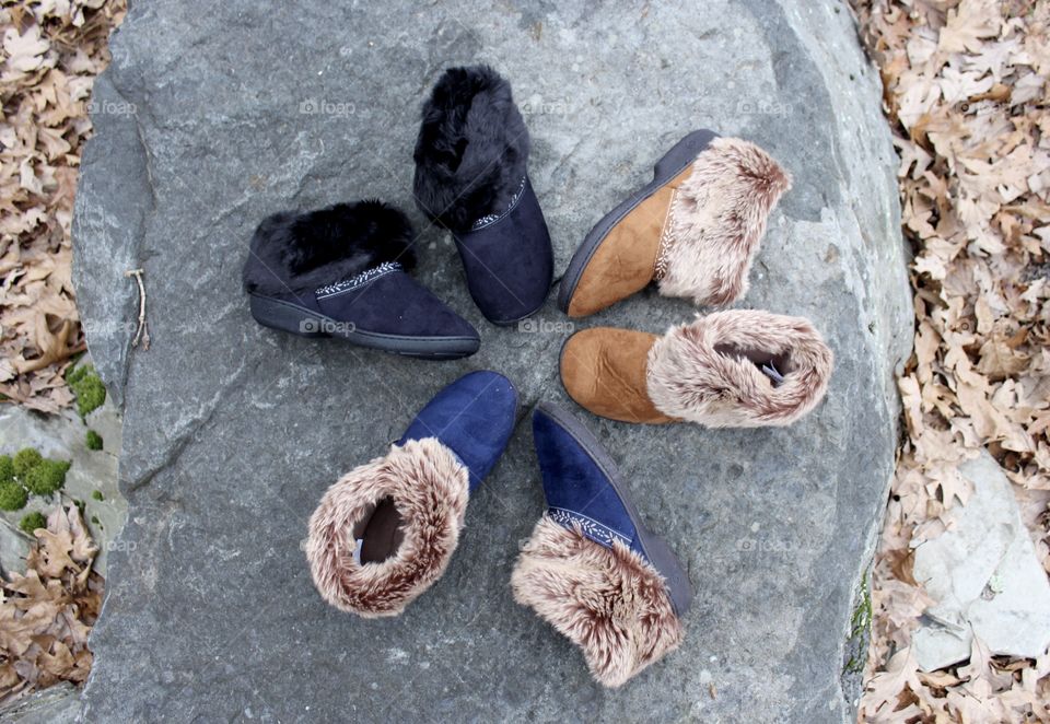 Three color way, flat lay slippers on rock
